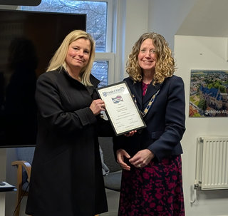 Photo of Deputy Mayor and Susanna leaver of SJL school